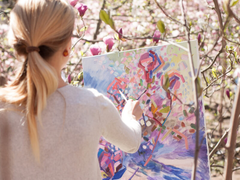 woman painting outdoors